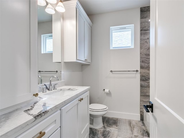 216 Pont Neuf Ct, Edmond, OK 73034 - bathroom with vanity and toilet
