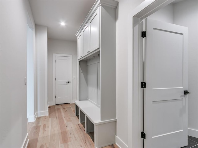 216 Pont Neuf Ct, Edmond, OK 73034 - mudroom with light wood-style floors and recessed lighting
