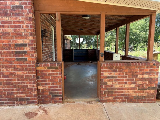view of patio / terrace with an exterior structure