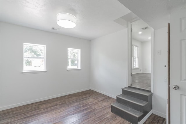 1120 SW 47th St, Oklahoma City, OK 73109 - spare room featuring wood finished floors and baseboards