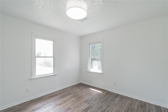 1120 SW 47th St, Oklahoma City, OK 73109 - empty room with wood finished floors and baseboards