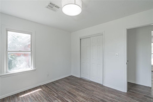 1120 SW 47th St, Oklahoma City, OK 73109 - unfurnished bedroom featuring wood finished floors and a closet