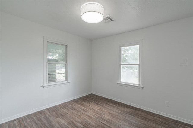 1120 SW 47th St, Oklahoma City, OK 73109 - empty room featuring wood finished floors and baseboards