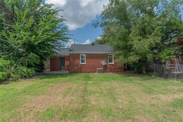 1120 SW 47th St, Oklahoma City, OK 73109 - rear view of house with brick siding