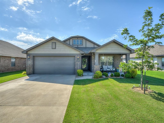 12812 Double V Dr, Piedmont, OK 73078 - view of front of house with an attached garage, concrete driveway, a front yard, covered porch, and brick siding