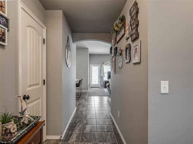 12812 Double V Dr, Piedmont, OK 73078 - corridor with arched walkways and baseboards