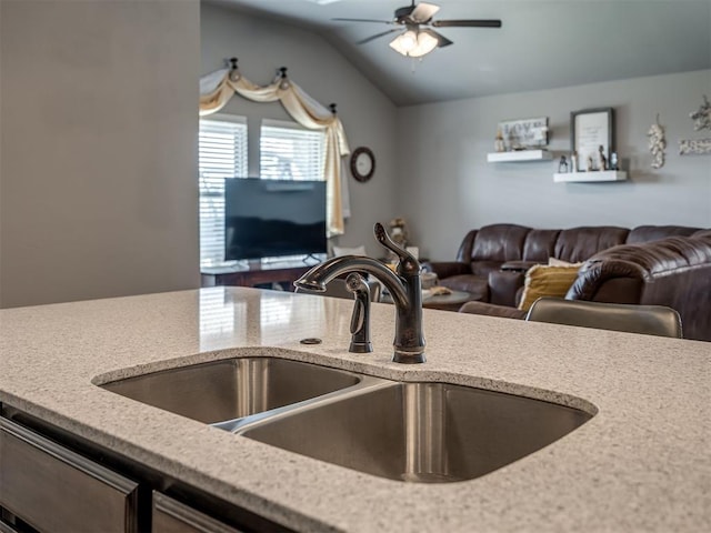 12812 Double V Dr, Piedmont, OK 73078 - kitchen with ceiling fan, open floor plan, lofted ceiling, and light stone counters