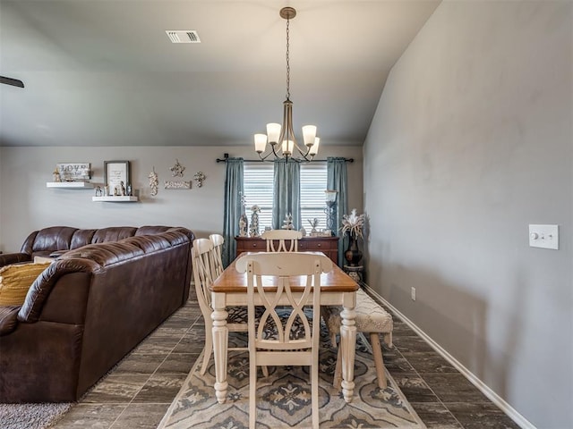12812 Double V Dr, Piedmont, OK 73078 - dining room with a chandelier and lofted ceiling