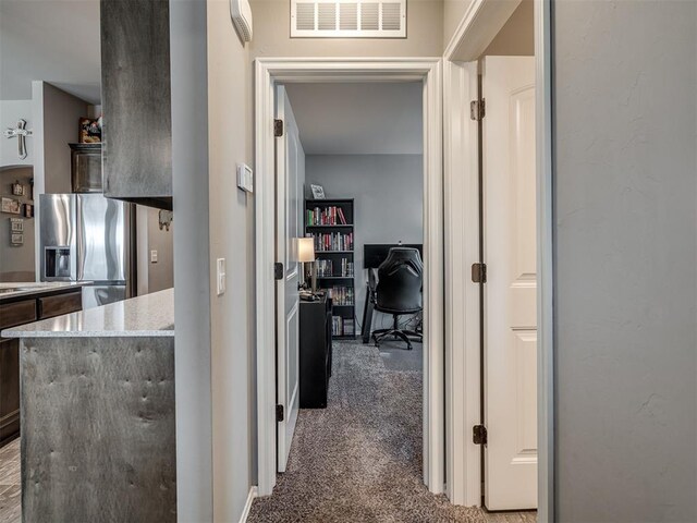 12812 Double V Dr, Piedmont, OK 73078 - hallway with carpet floors and a desk