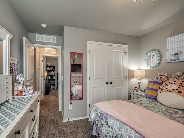 12812 Double V Dr, Piedmont, OK 73078 - bedroom featuring dark carpet and a closet