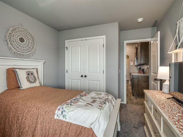 12812 Double V Dr, Piedmont, OK 73078 - bedroom with dark colored carpet and a closet