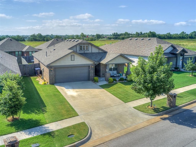 12812 Double V Dr, Piedmont, OK 73078 - view of front of home with a garage, brick siding, concrete driveway, and covered porch
