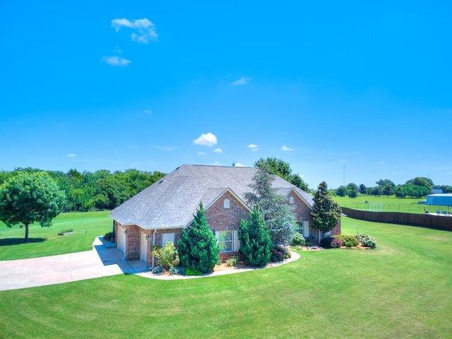 775 Magnolia Ln, Tuttle, OK 73089 - ranch-style house featuring concrete driveway and brick siding