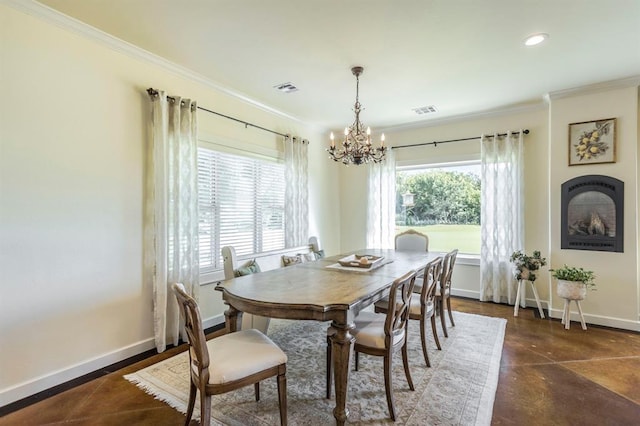 775 Magnolia Ln, Tuttle, OK 73089 - dining space with a chandelier, crown molding, and recessed lighting