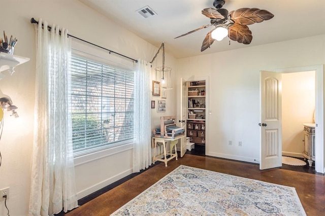 775 Magnolia Ln, Tuttle, OK 73089 - office space with a ceiling fan, plenty of natural light, and finished concrete flooring