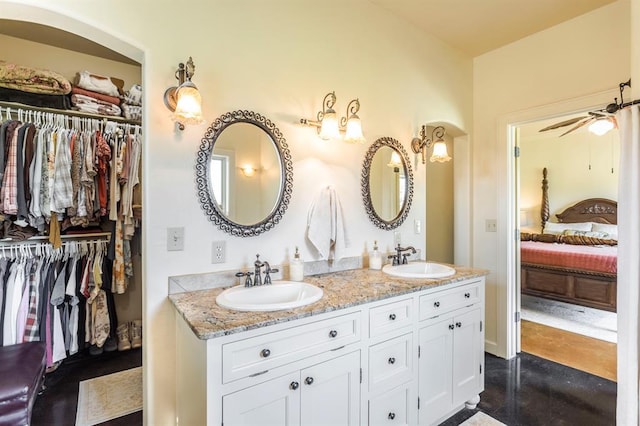 775 Magnolia Ln, Tuttle, OK 73089 - full bathroom with ensuite bath, double vanity, concrete floors, and a spacious closet