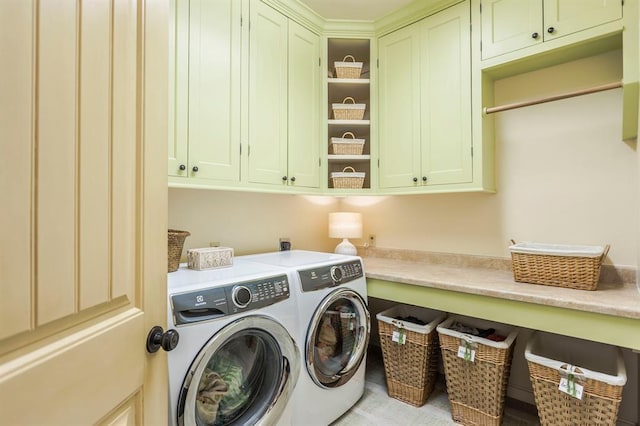 775 Magnolia Ln, Tuttle, OK 73089 - washroom with cabinet space and separate washer and dryer