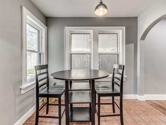 1623 NW 39th St, Oklahoma City, OK 73118 - dining space featuring arched walkways and baseboards