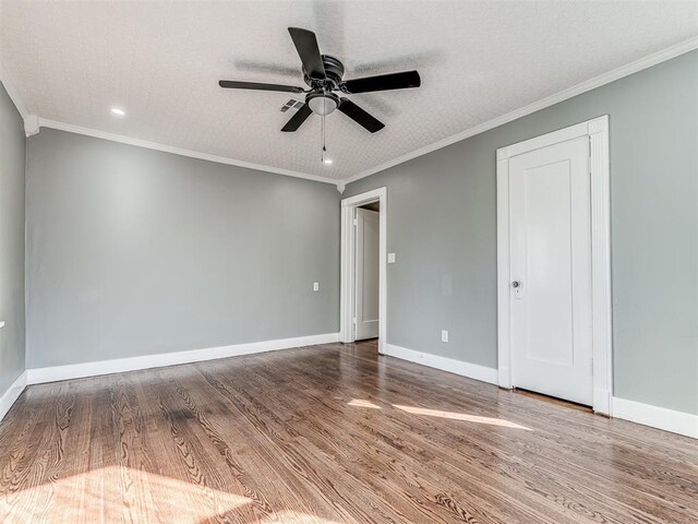 1623 NW 39th St, Oklahoma City, OK 73118 - unfurnished room featuring recessed lighting, ceiling fan, wood finished floors, and ornamental molding