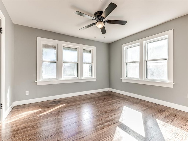 1623 NW 39th St, Oklahoma City, OK 73118 - spare room featuring wood finished floors and ceiling fan