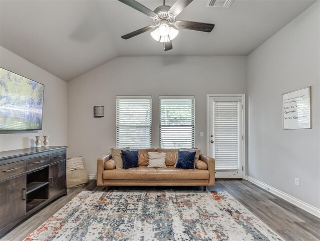 3529 Slate River Dr, Yukon, OK 73099 - living area with wood finished floors, ceiling fan, and lofted ceiling