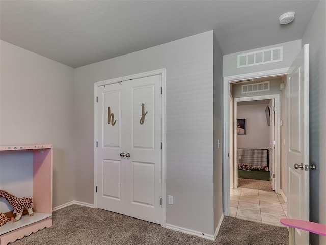 3529 Slate River Dr, Yukon, OK 73099 - unfurnished bedroom featuring carpet floors and a closet