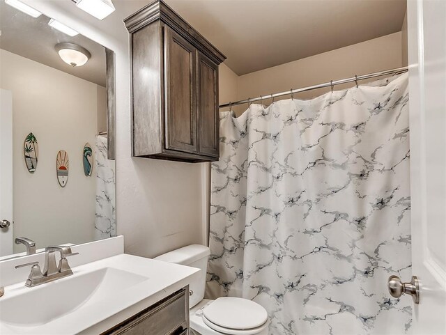 3529 Slate River Dr, Yukon, OK 73099 - bathroom featuring vanity and a shower with shower curtain