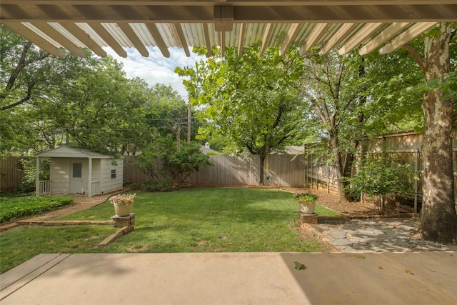 1114 Glenwood Ave, Nichols Hills, OK 73116 - fenced backyard with a patio area and an outdoor structure