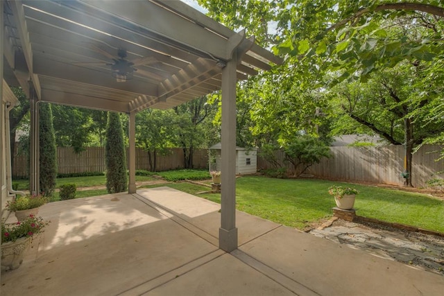 1114 Glenwood Ave, Nichols Hills, OK 73116 - fenced backyard featuring a ceiling fan, a patio area, and a shed