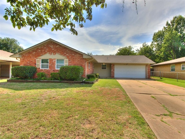 3013 Beverly Dr, Edmond, OK 73013 - single story home with brick siding, a garage, and concrete driveway