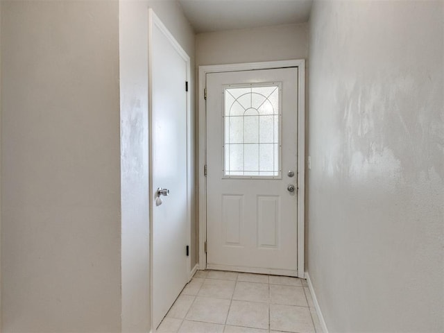 3013 Beverly Dr, Edmond, OK 73013 - doorway to outside featuring light tile patterned floors and baseboards