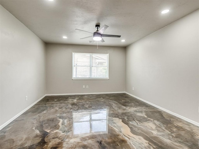 3013 Beverly Dr, Edmond, OK 73013 - spare room with a ceiling fan, recessed lighting, and concrete flooring