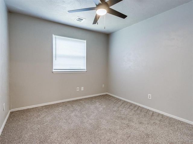 3013 Beverly Dr, Edmond, OK 73013 - unfurnished room with carpet floors and a ceiling fan