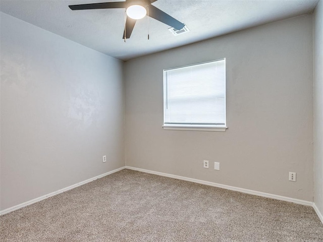 3013 Beverly Dr, Edmond, OK 73013 - carpeted spare room featuring baseboards and ceiling fan