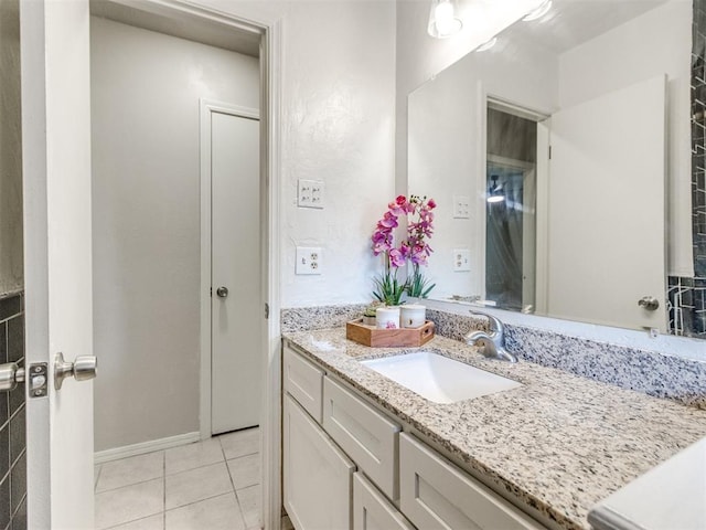 3013 Beverly Dr, Edmond, OK 73013 - bathroom with vanity and tile patterned floors