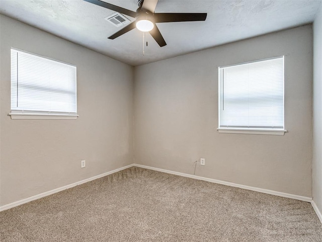 3013 Beverly Dr, Edmond, OK 73013 - spare room with carpet floors and ceiling fan