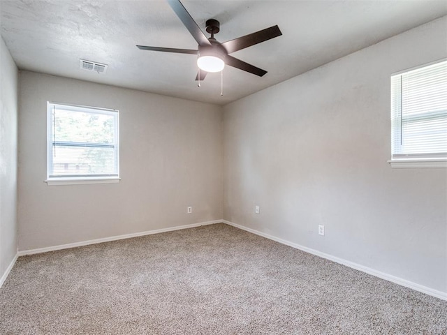 3013 Beverly Dr, Edmond, OK 73013 - carpeted spare room featuring ceiling fan and baseboards