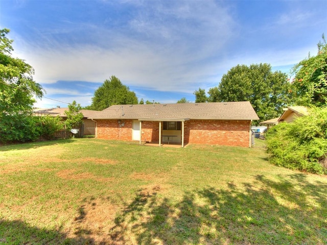 3013 Beverly Dr, Edmond, OK 73013 - back of property featuring brick siding