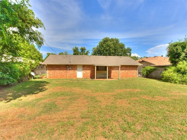 3013 Beverly Dr, Edmond, OK 73013 - rear view of house featuring brick siding