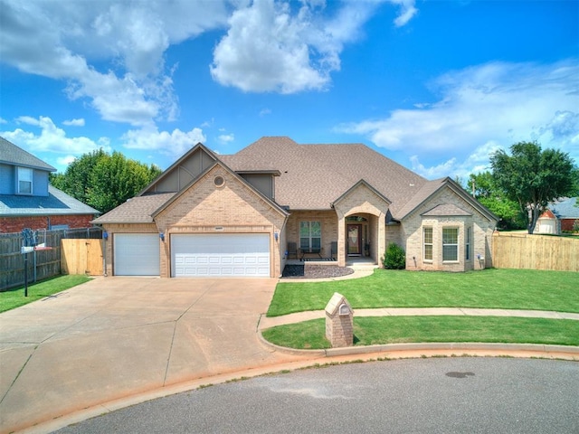 view of front of property featuring brick siding, concrete driveway, a garage, and roof with shingles