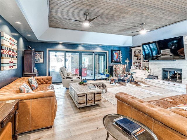 1521 Spring Creek Dr, Yukon, OK 73099 - living room featuring hardwood / wood-style flooring, ceiling fan, a brick fireplace, and recessed lighting
