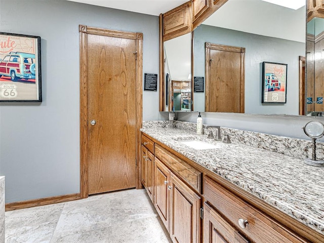 1521 Spring Creek Dr, Yukon, OK 73099 - bathroom featuring vanity and stone finish floors