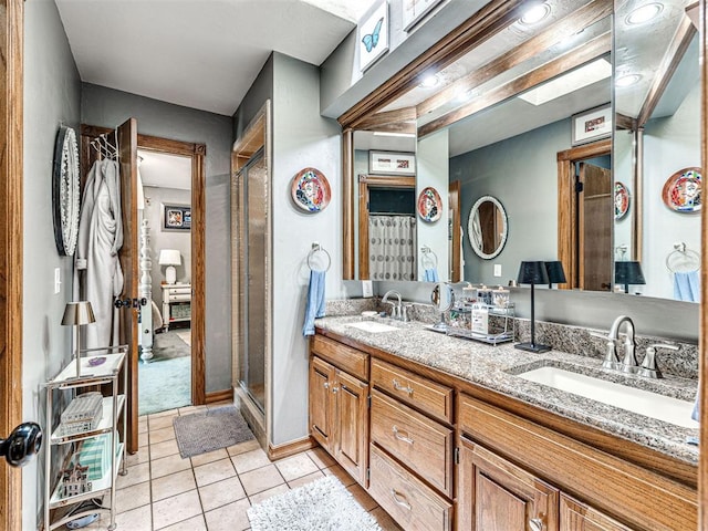 1521 Spring Creek Dr, Yukon, OK 73099 - full bathroom featuring tile patterned flooring, double vanity, and a shower