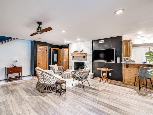 1521 Spring Creek Dr, Yukon, OK 73099 - living area with a ceiling fan, light wood-type flooring, a fireplace, and recessed lighting