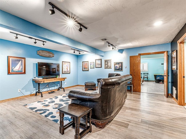 1521 Spring Creek Dr, Yukon, OK 73099 - living room featuring track lighting and wood finished floors