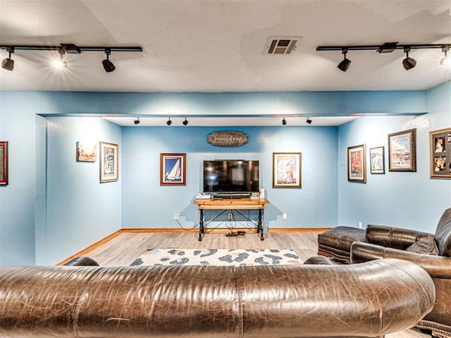 1521 Spring Creek Dr, Yukon, OK 73099 - living area featuring track lighting and wood finished floors