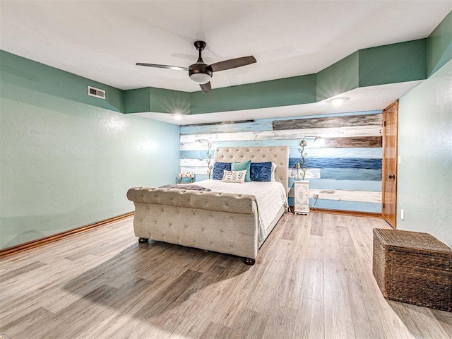 1521 Spring Creek Dr, Yukon, OK 73099 - bedroom featuring wood finished floors and ceiling fan