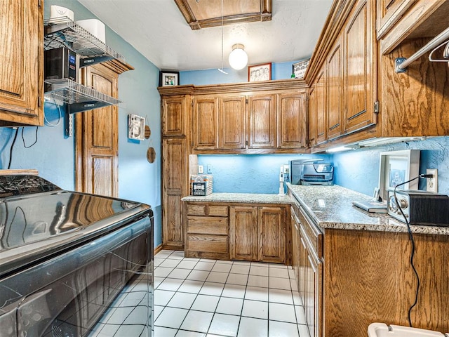 1521 Spring Creek Dr, Yukon, OK 73099 - kitchen featuring range with electric cooktop, brown cabinets, and light countertops