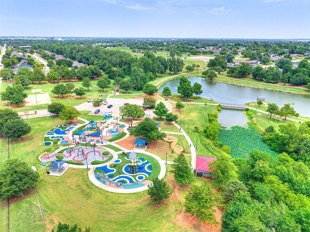 1521 Spring Creek Dr, Yukon, OK 73099 - drone / aerial view of a nearby body of water and a tree filled landscape