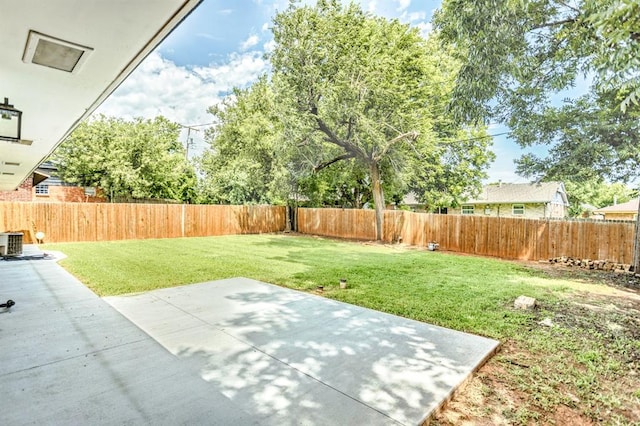 27 NE 65th St, Oklahoma City, OK 73105 - fenced backyard featuring a patio area
